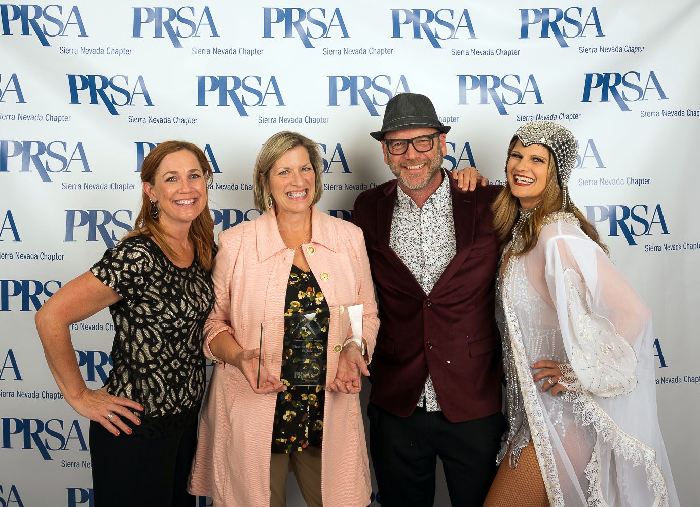 Child bouncing on trampoline while wearing a harness